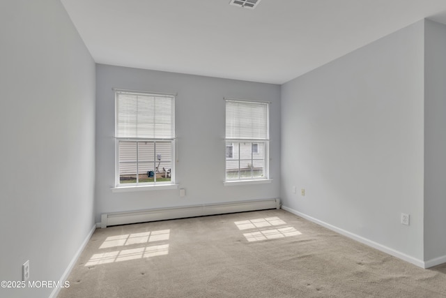 34 Meadows Ln, Manchester, NJ 08759 - unfurnished room featuring baseboards, a baseboard heating unit, and carpet floors