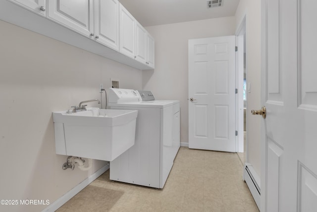 34 Meadows Ln, Manchester, NJ 08759 - clothes washing area featuring light floors, a baseboard radiator, washer and dryer, cabinet space, and a sink