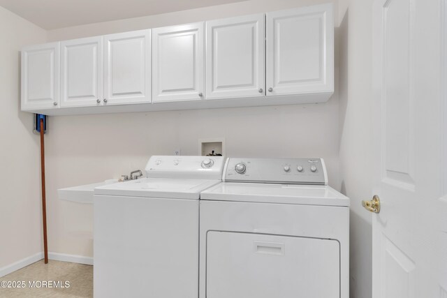 34 Meadows Ln, Manchester, NJ 08759 - laundry area featuring separate washer and dryer, cabinet space, and baseboards