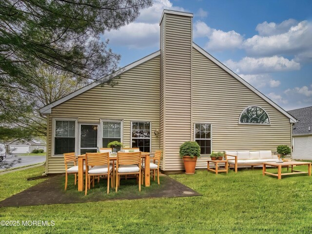 34 Meadows Ln, Manchester, NJ 08759 - rear view of house with a lawn, a chimney, a patio, and outdoor lounge area