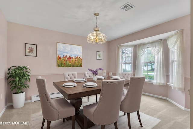 34 Meadows Ln, Manchester, NJ 08759 - dining area with light colored carpet, a chandelier, baseboard heating, baseboards, and visible vents