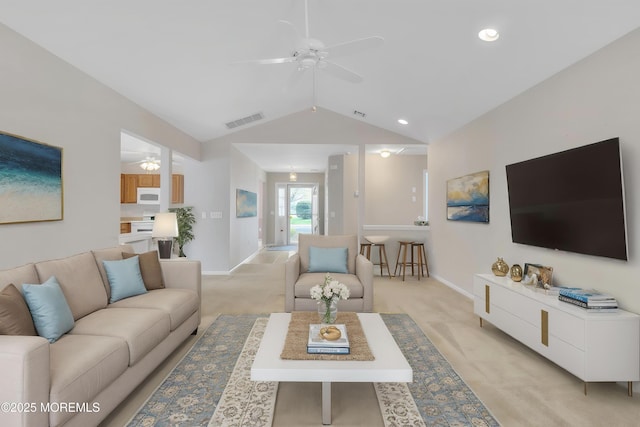 34 Meadows Ln, Manchester, NJ 08759 - living room with visible vents, light carpet, ceiling fan, and vaulted ceiling