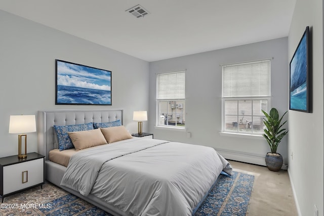 34 Meadows Ln, Manchester, NJ 08759 - bedroom featuring a baseboard heating unit, visible vents, carpet, and baseboards