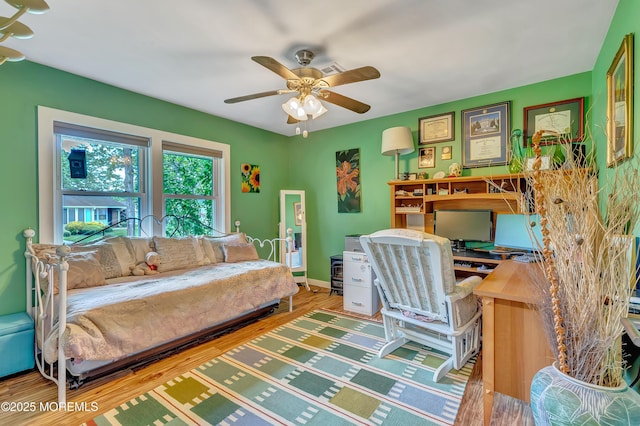 627 Huntington Dr Unit C, Lakewood, NJ 08701 - bedroom featuring wood finished floors, a ceiling fan, an office area, and baseboards