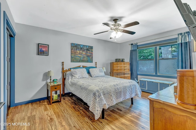 627 Huntington Dr Unit C, Lakewood, NJ 08701 - bedroom with light wood-style floors, a ceiling fan, and baseboards