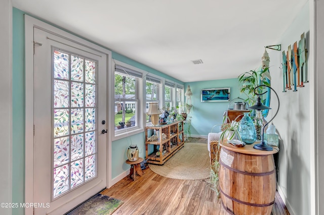 627 Huntington Dr Unit C, Lakewood, NJ 08701 - doorway featuring wood finished floors and baseboards