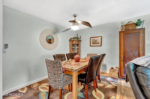 627 Huntington Dr Unit C, Lakewood, NJ 08701 - dining area featuring baseboards, ceiling fan, and wood finished floors