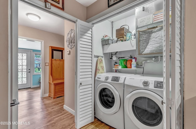 627 Huntington Dr Unit C, Lakewood, NJ 08701 - laundry area featuring washer and clothes dryer, light wood-type flooring, and baseboards