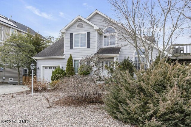 42 Circle Ct, Brick, NJ 08723 - traditional-style house with roof with shingles and a garage
