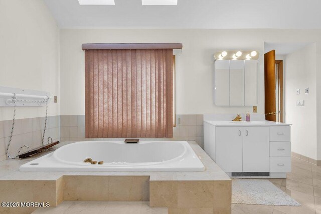 42 Circle Ct, Brick, NJ 08723 - bathroom with tile patterned floors, a garden tub, and vanity