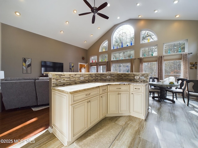 89 Pebble Beach Blvd, Jackson, NJ 08527 - kitchen featuring cream cabinets, a ceiling fan, recessed lighting, open floor plan, and light stone counters