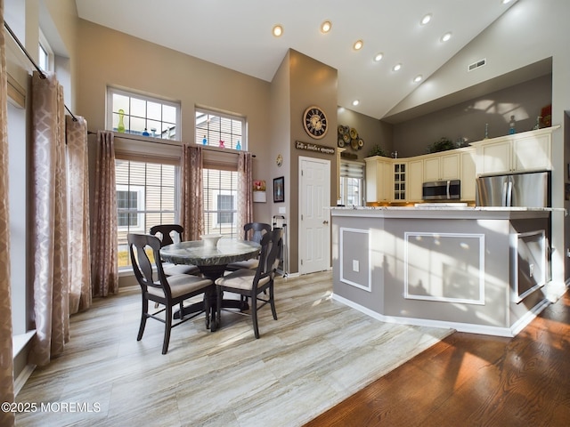 89 Pebble Beach Blvd, Jackson, NJ 08527 - dining space with high vaulted ceiling, recessed lighting, and light wood-style floors