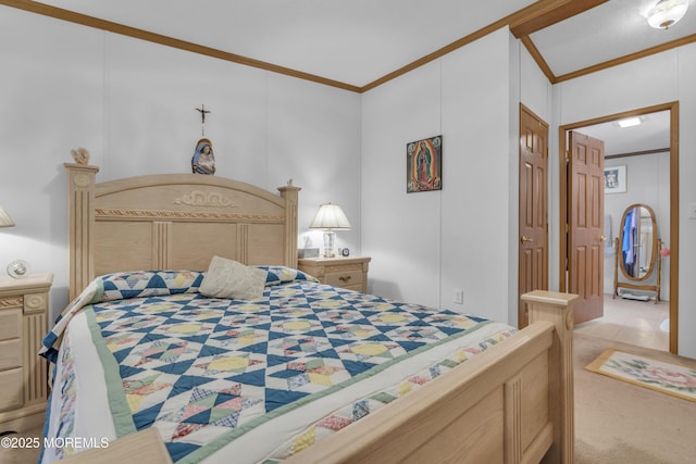 carpeted bedroom featuring ornamental molding
