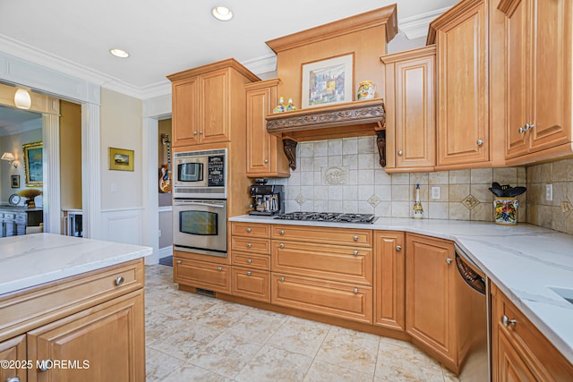 kitchen with crown molding, light stone counters, backsplash, and stainless steel appliances