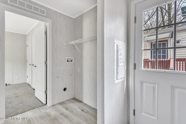 2505 Woodbridge Ave Unit 32Lane M, Edison, NJ 08817 - laundry area featuring wood finished floors, visible vents, washer hookup, and ornamental molding