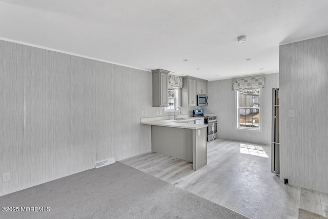 2505 Woodbridge Ave Unit 32Lane M, Edison, NJ 08817 - kitchen with stainless steel appliances, a sink, visible vents, gray cabinets, and light countertops