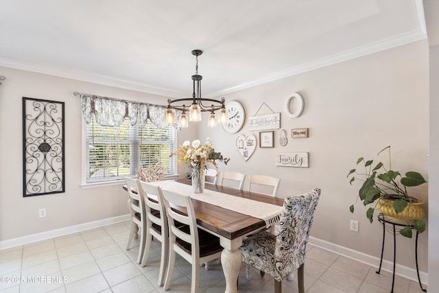 dining area featuring an inviting chandelier, light tile patterned floors, and ornamental molding