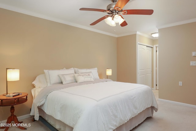 bedroom with baseboards, ornamental molding, a closet, and light colored carpet