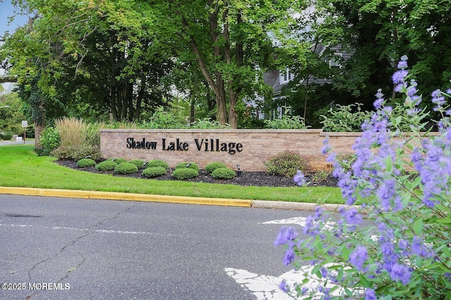 view of community sign