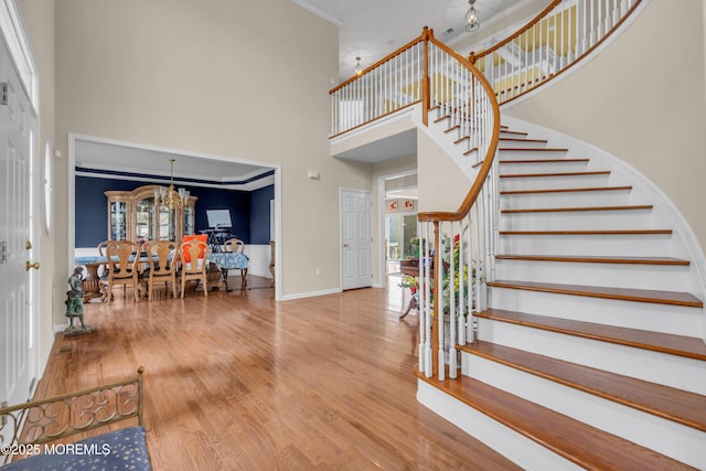 3 Scenic Way, Monroe, NJ 08831 - entryway featuring stairs, a notable chandelier, a towering ceiling, and baseboards