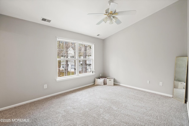 2304 Wendover Dr, Pompton Plains, NJ 07444 - unfurnished room featuring vaulted ceiling, visible vents, baseboards, carpet flooring, and ceiling fan