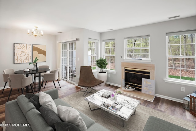 2304 Wendover Dr, Pompton Plains, NJ 07444 - living area with baseboards, a notable chandelier, visible vents, and plenty of natural light