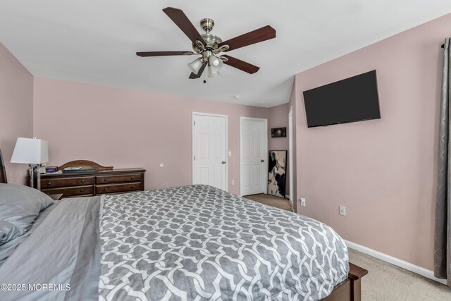 30 Frost Ln, East Windsor, NJ 08520 - bedroom with baseboards, light carpet, and ceiling fan