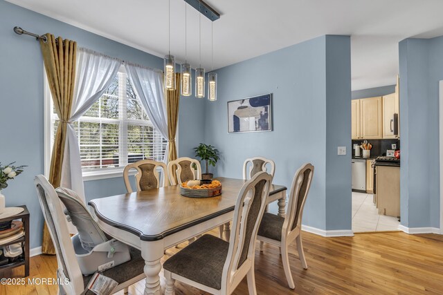 30 Frost Ln, East Windsor, NJ 08520 - dining room with baseboards and light wood-style flooring