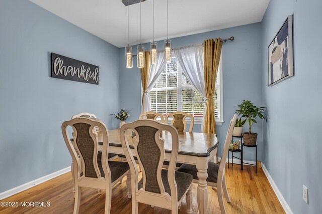 30 Frost Ln, East Windsor, NJ 08520 - dining space with light wood-style floors and baseboards