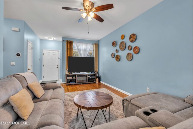 30 Frost Ln, East Windsor, NJ 08520 - living area with baseboards, ceiling fan, and wood finished floors