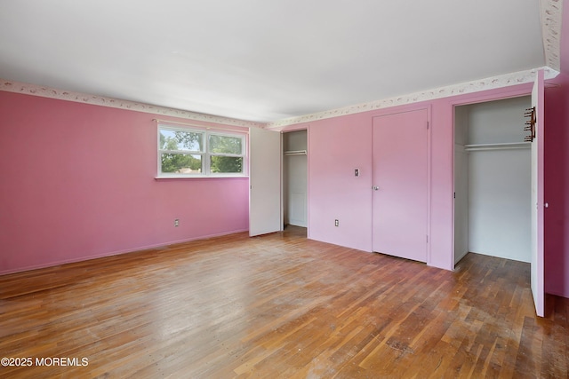 5 Pennsylvania Ave, Jackson, NJ 08527 - unfurnished bedroom featuring multiple closets and light wood-style floors