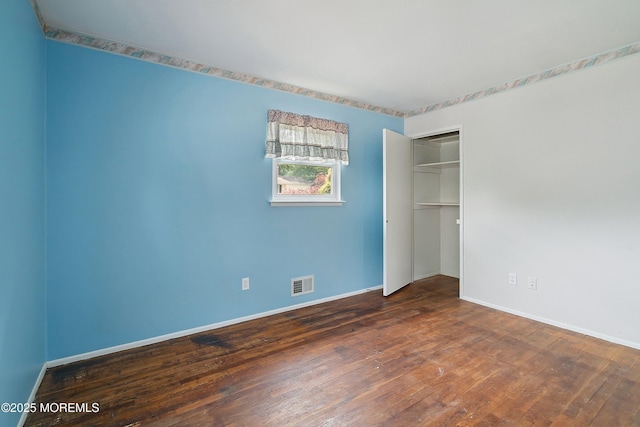 5 Pennsylvania Ave, Jackson, NJ 08527 - unfurnished bedroom featuring wood-type flooring and a closet