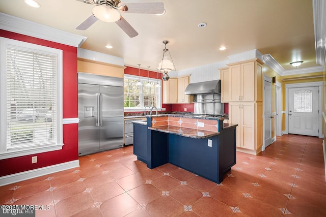 159 Sprague Ave, West Creek, NJ 08092 - kitchen featuring ceiling fan, a kitchen island with sink, stainless steel built in fridge, baseboards, and wall chimney exhaust hood