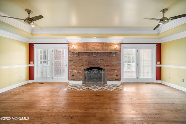 159 Sprague Ave, West Creek, NJ 08092 - unfurnished living room with crown molding, ceiling fan, baseboards, and hardwood / wood-style floors
