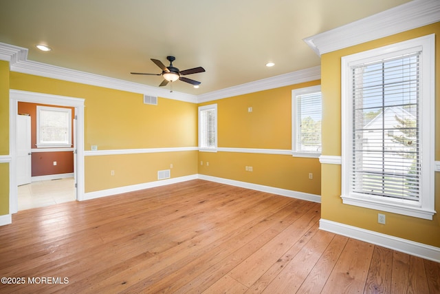 159 Sprague Ave, West Creek, NJ 08092 - spare room with visible vents, ornamental molding, baseboards, a ceiling fan, and light wood finished floors