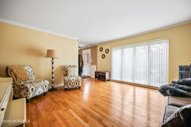 191 Robertsville Rd, Freehold, NJ 07728 - living area with wood finished floors, baseboards, and ornamental molding