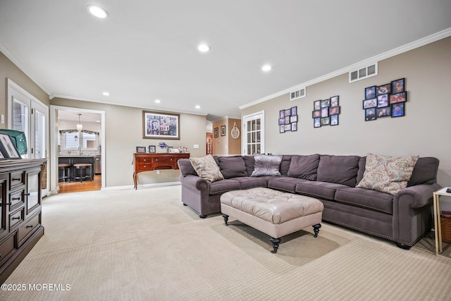 191 Robertsville Rd, Freehold, NJ 07728 - living room with light carpet, visible vents, and crown molding