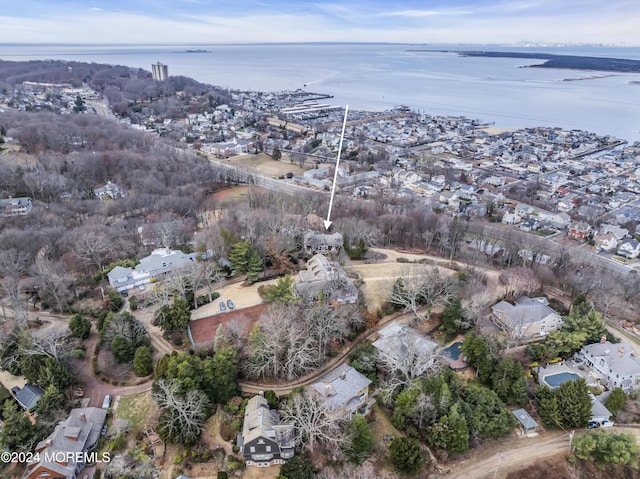 aerial view with a water view and a residential view