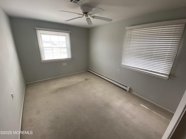 unfurnished room featuring a baseboard radiator, ceiling fan, light colored carpet, visible vents, and baseboards