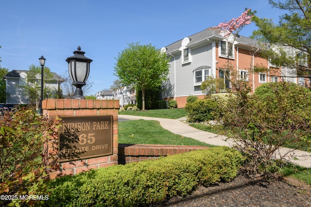 65 E River Rd Unit 14, Rumson, NJ 07760 - community / neighborhood sign featuring a lawn