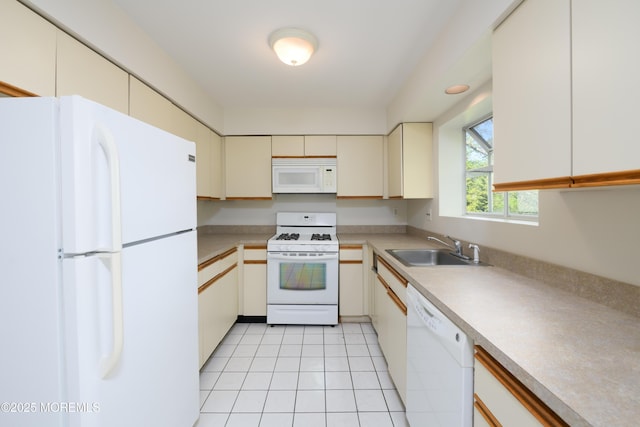 65 E River Rd Unit 14, Rumson, NJ 07760 - kitchen featuring white appliances, light tile patterned floors, a sink, and light countertops