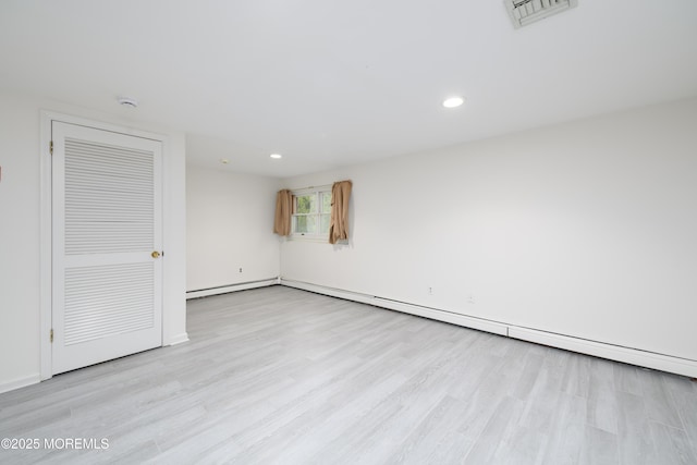 65 E River Rd Unit 14, Rumson, NJ 07760 - unfurnished room featuring baseboards, recessed lighting, wood finished floors, and visible vents