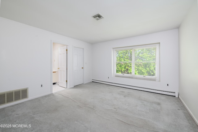 65 E River Rd Unit 14, Rumson, NJ 07760 - carpeted empty room with visible vents, baseboards, and baseboard heating