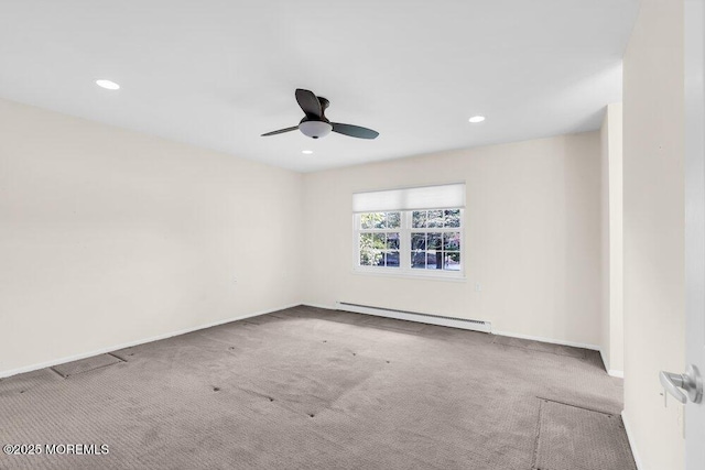 carpeted empty room with recessed lighting, baseboards, a ceiling fan, and baseboard heating