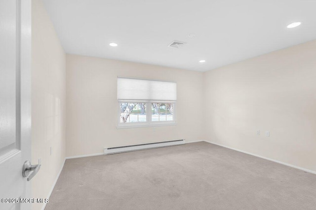 carpeted empty room featuring baseboard heating, baseboards, visible vents, and recessed lighting