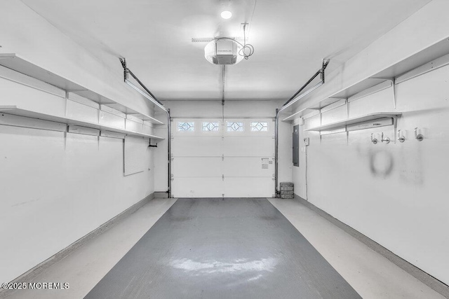 garage with electric panel and a garage door opener