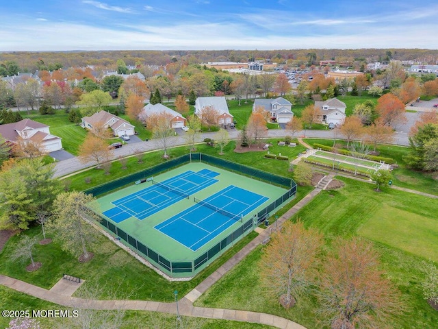 birds eye view of property with a residential view