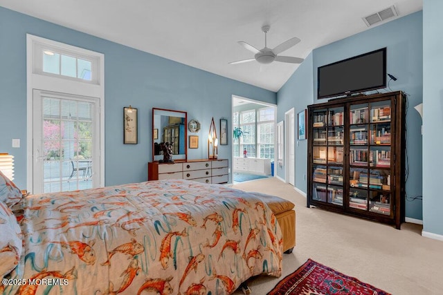 bedroom featuring visible vents, lofted ceiling, access to exterior, baseboards, and carpet
