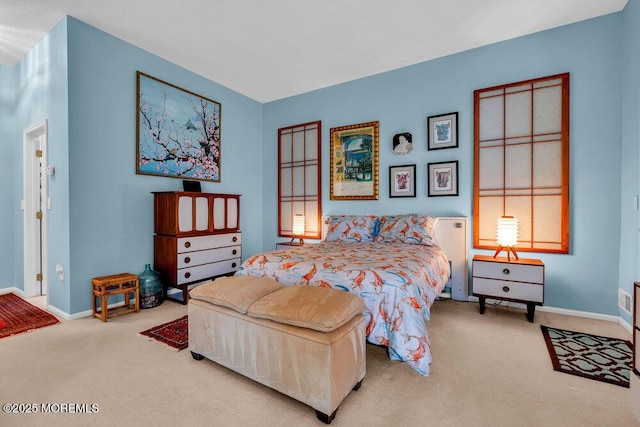 bedroom with carpet flooring and baseboards