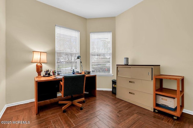 office space featuring baseboards